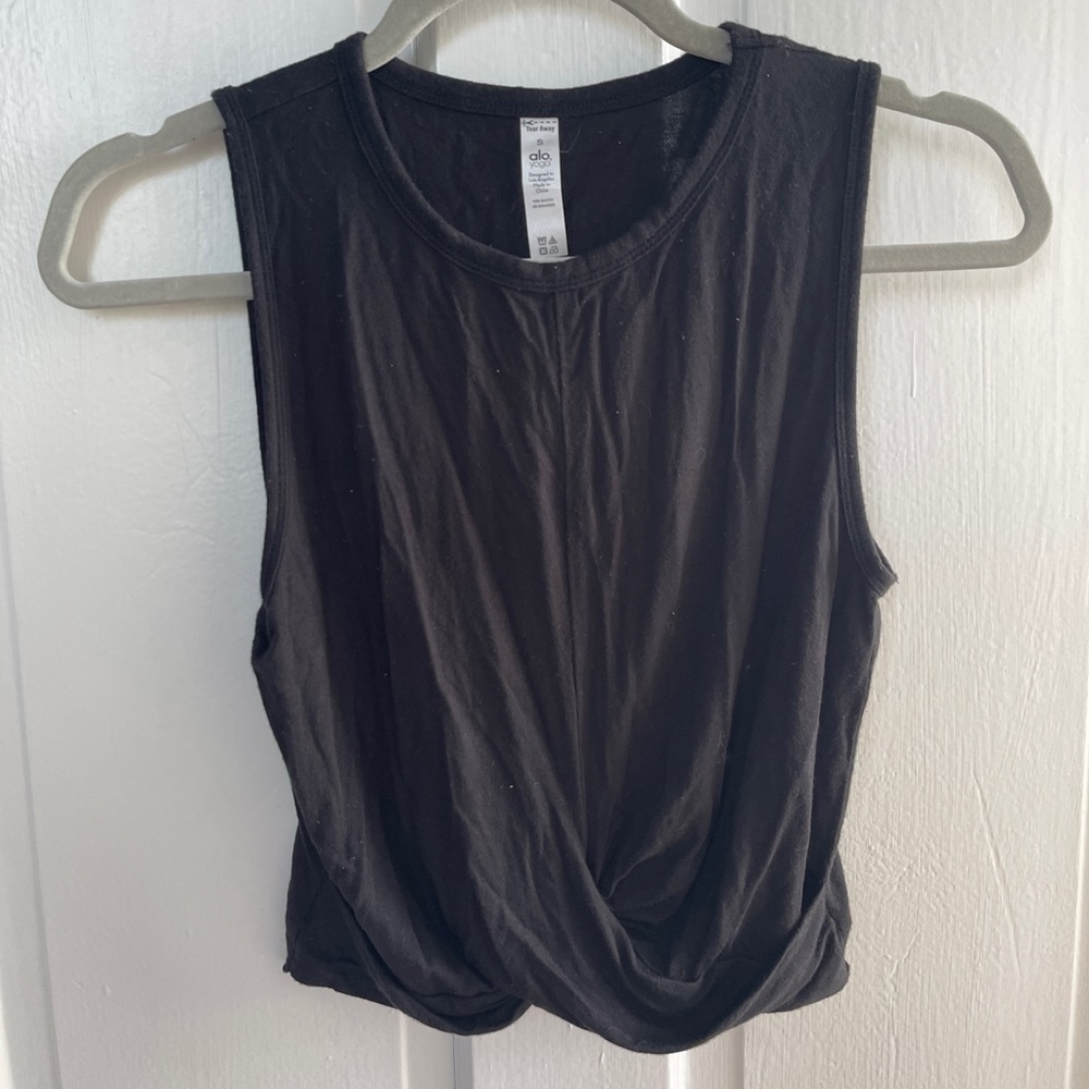 Black Alo Yoga cropped workout top.